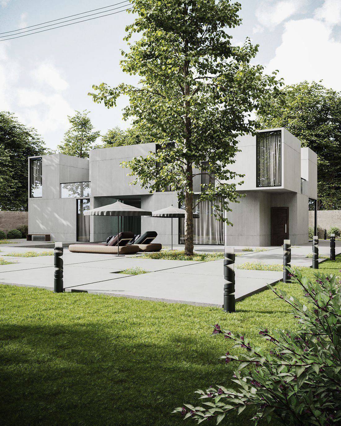 Pale concrete townhouses set around a planted communal lawn