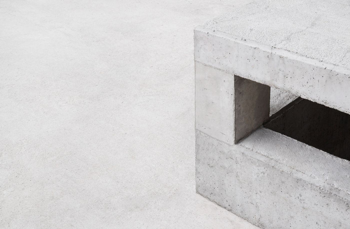 Close view of a deep window reveal cut through a concrete wall